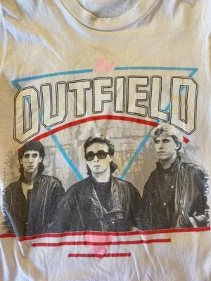 The Outfield Band Members Black Color Tee Shirt